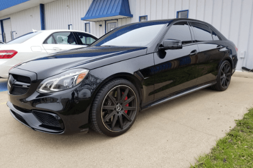 Why Does European Auto Repair Need a Specialist? with Accelerate Auto Repair in Rowlett, TX image of black Mercedes car parked out in front of shop office