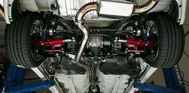 bolt-on mods underneath a vehicle, installed at Accelerate Auto Repair