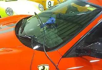 Ferrari undergoing windshield repair at Accelerate Auto Repair