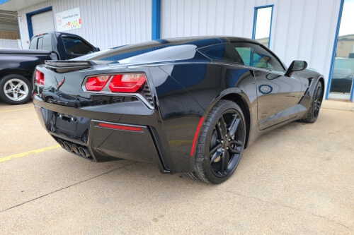 Corvette parked outside of Accelerate Auto Repair; stop by for muscle & sports car servicing and repair