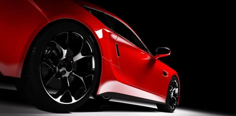 Red Car with Black Background - Accelerate Auto Repair and Collision