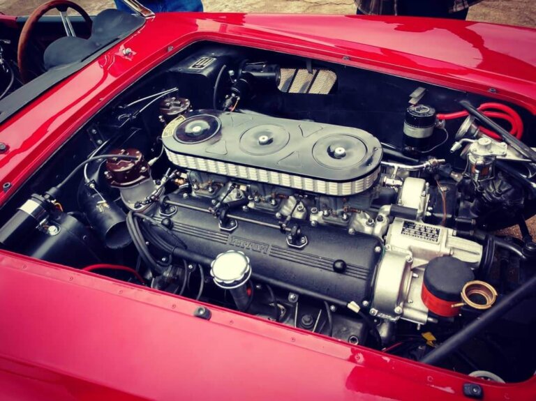 Close-up of a Ferrari engine assembly.