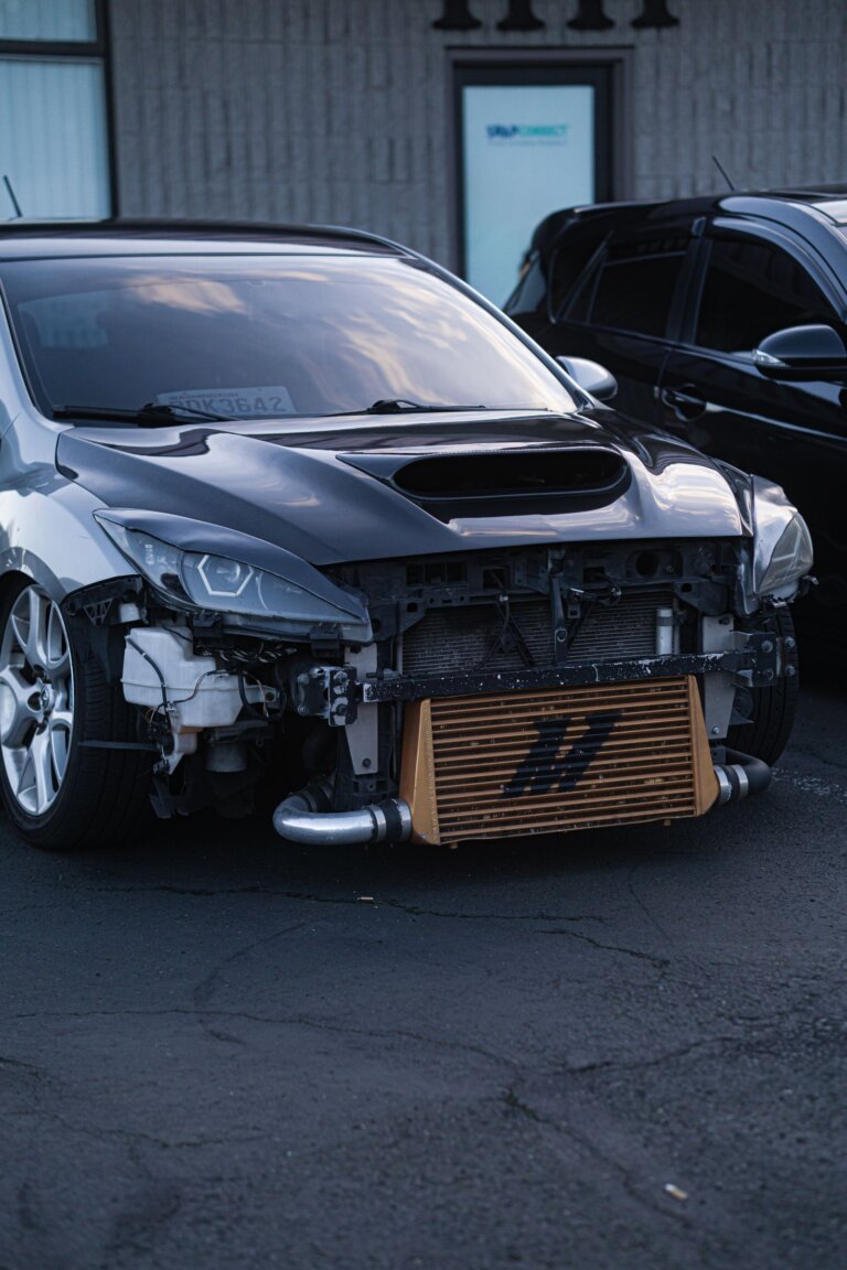 Front-mount intercooler visible behind the bumper of a sports car
