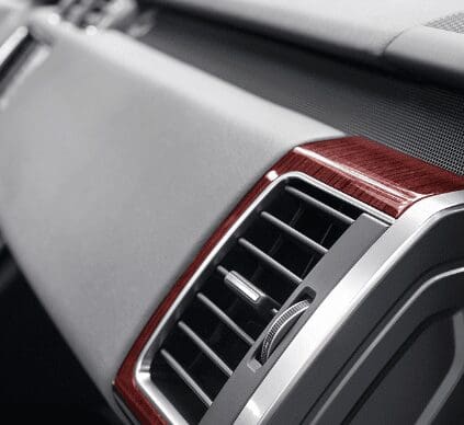 An air vent inside a vehicle cabin.